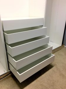 How to use Ikea PAX wardrobes, plus some crown molding and baseboard trim, to get an amazing custom look!